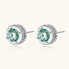 Round green moissanite stud earrings in sterling silver halo settings with brilliant sparkle on white background.